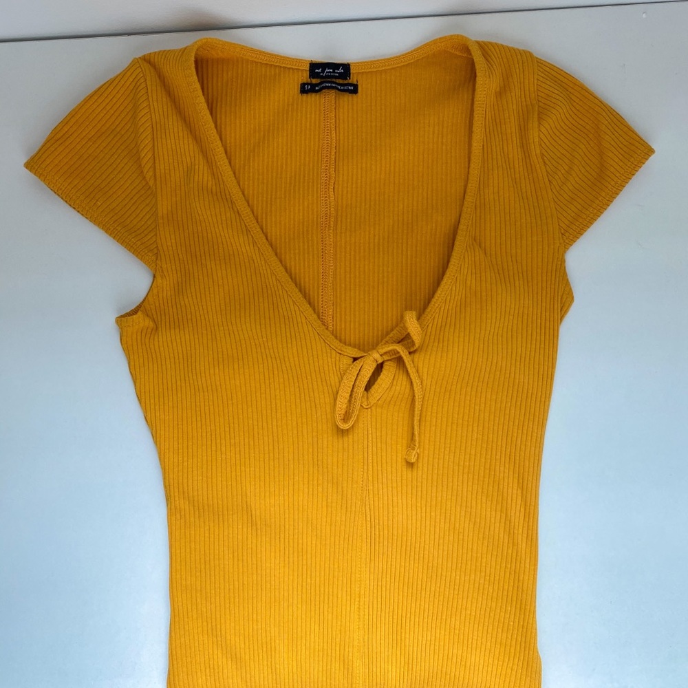 URBAN OUTFITTERS YELLOW BODYSUIT